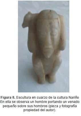 Escultura portando un venado pequeño sobre los hombros Escultura portando un venado pequeño sobre los hombros